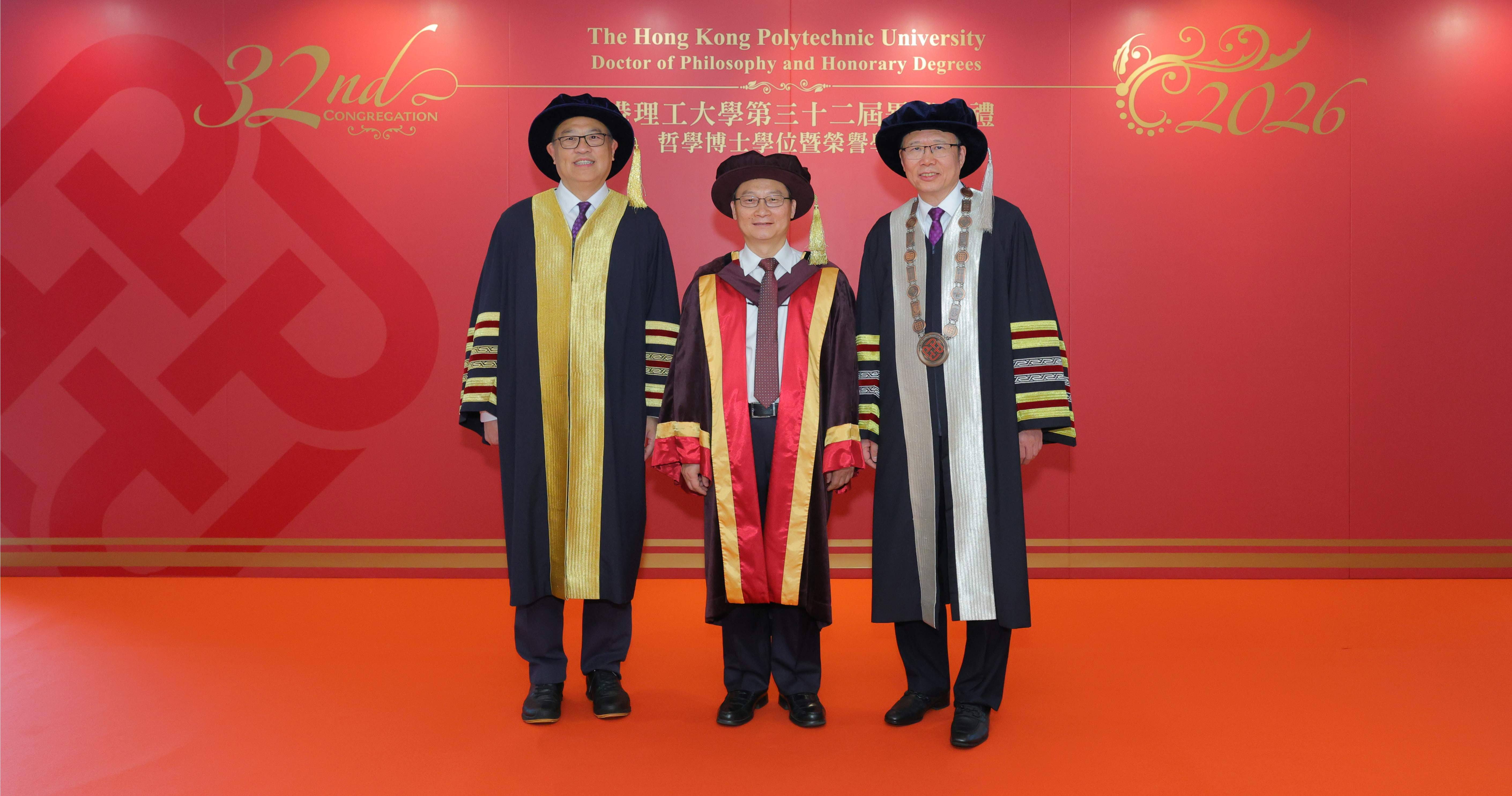 PolyU Council Chairman Dr Lam Tai-fai (left) and President Prof. Jin-Guang Teng (right) congratulate the Honorary Doctorate recipient Prof. Han Jiecai (centre).