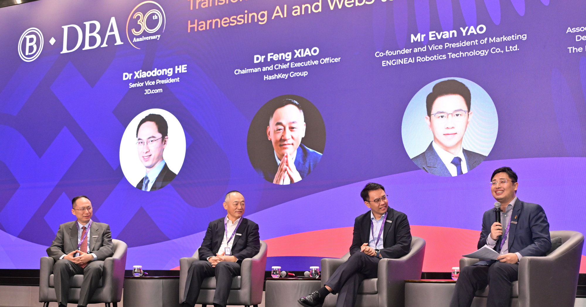Facilitated by Prof. Jimmy Jin, Associate Dean (External Relations and Development) of the PolyU Faculty of Business (1st from right), Dr Xiaodong He, Senior Vice President of JD.com (1st from left); Dr Feng Xiao, Chairman and Chief Executive Officer of HashKey Group (2nd from left); and Mr Evan Yao, Co-founder and Vice President of Marketing at ENGINEAI Robotics Technology (2nd from right), engaged in the panel discussion.