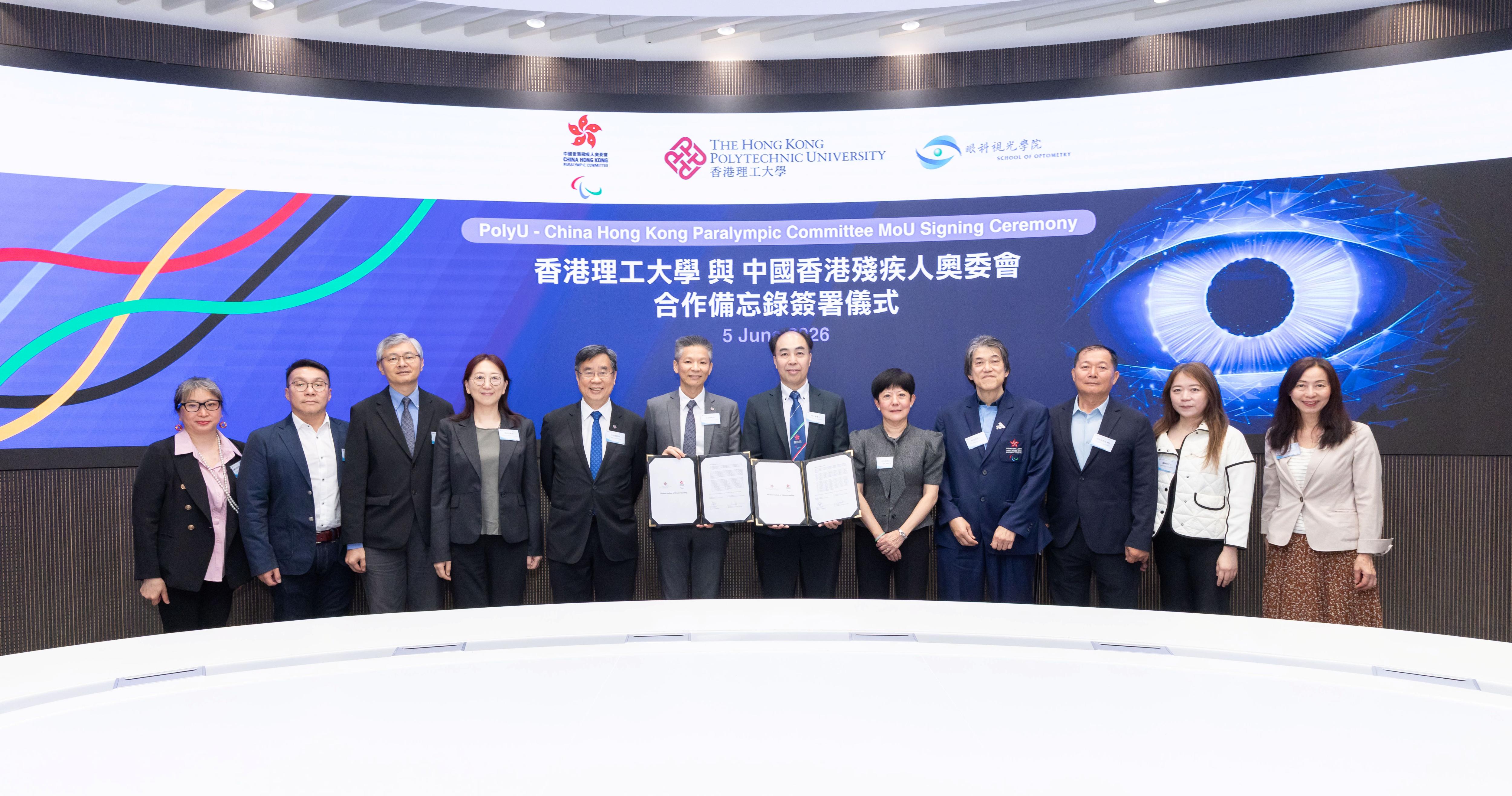 Representatives from PolyU and HKPC attended the MoU signing ceremony. Attendees included Prof. David Shum, Dean of the PolyU Faculty of Health and Social Sciences (5th from left); Prof. Kee Chea-su, Head of the PolyU School of Optometry (6th from left); Prof. Andrew Lam (3rd from left) and Prof. Allen Cheong (4th from left), Associate Heads and Professors of the School of Optometry; Dr Helen Eng, Senior Research Fellow of the School of Optometry (1st from left); Mrs Jenny Fung, President of China Hong Kong Paralympic Committee (5th from right); Dr Jim Luk, Vice President of China Hong Kong Paralympic Committee (6th from right); Mr Henry Lam, Treasurer of HKPC (4th from right); Mr Benny Cheung, Member At Large of China Hong Kong Paralympic Committee (3rd from right); Ms Genevieve Pong, Member At Large of China Hong Kong Paralympic Committee (2nd from right); and Ms Elaine Wu, Executive Director of China Hong Kong Paralympic Committee (1st from right).